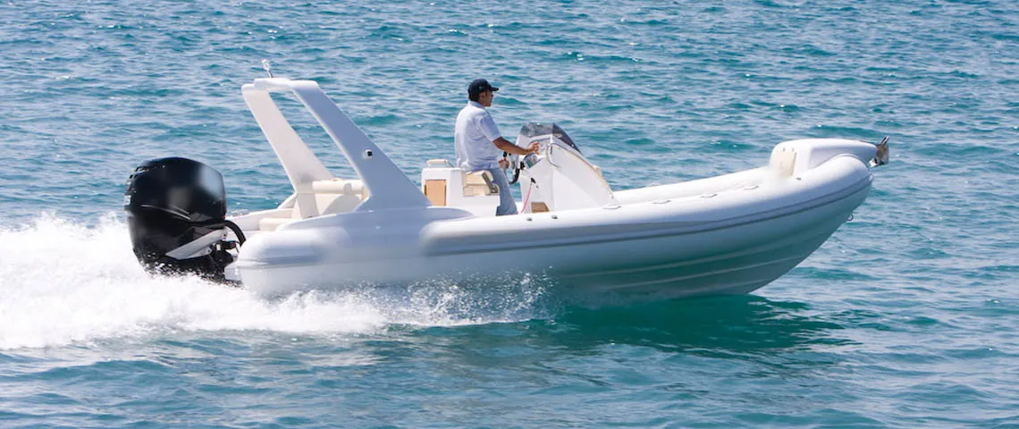Rigid inflatable boat running offshore at speed